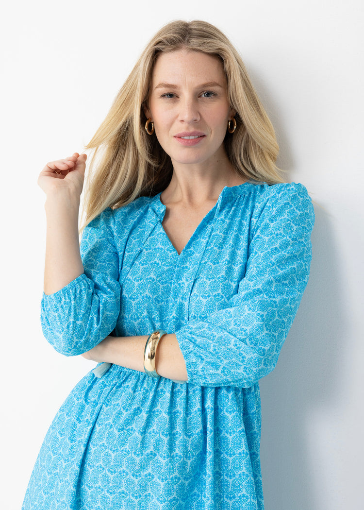 Close up of a blonde woman wearing Rosebay Relaxed Maxi Dress in a studio.