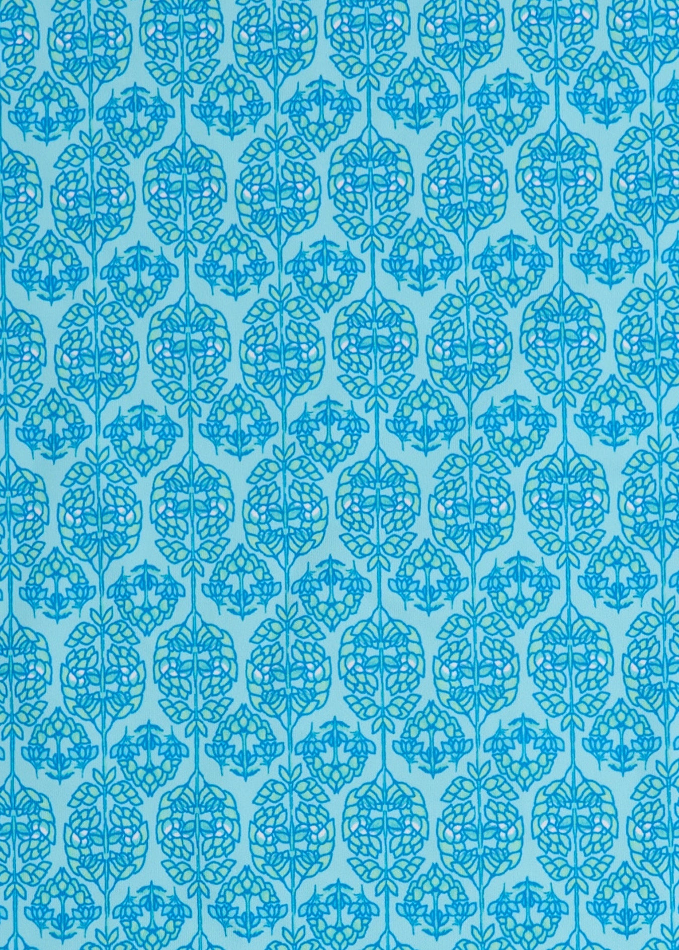 A close up of the UPF 50+ blue printed woven fabric on the Cabana Life Rosebay 1/4 Zip Sport Dress.
