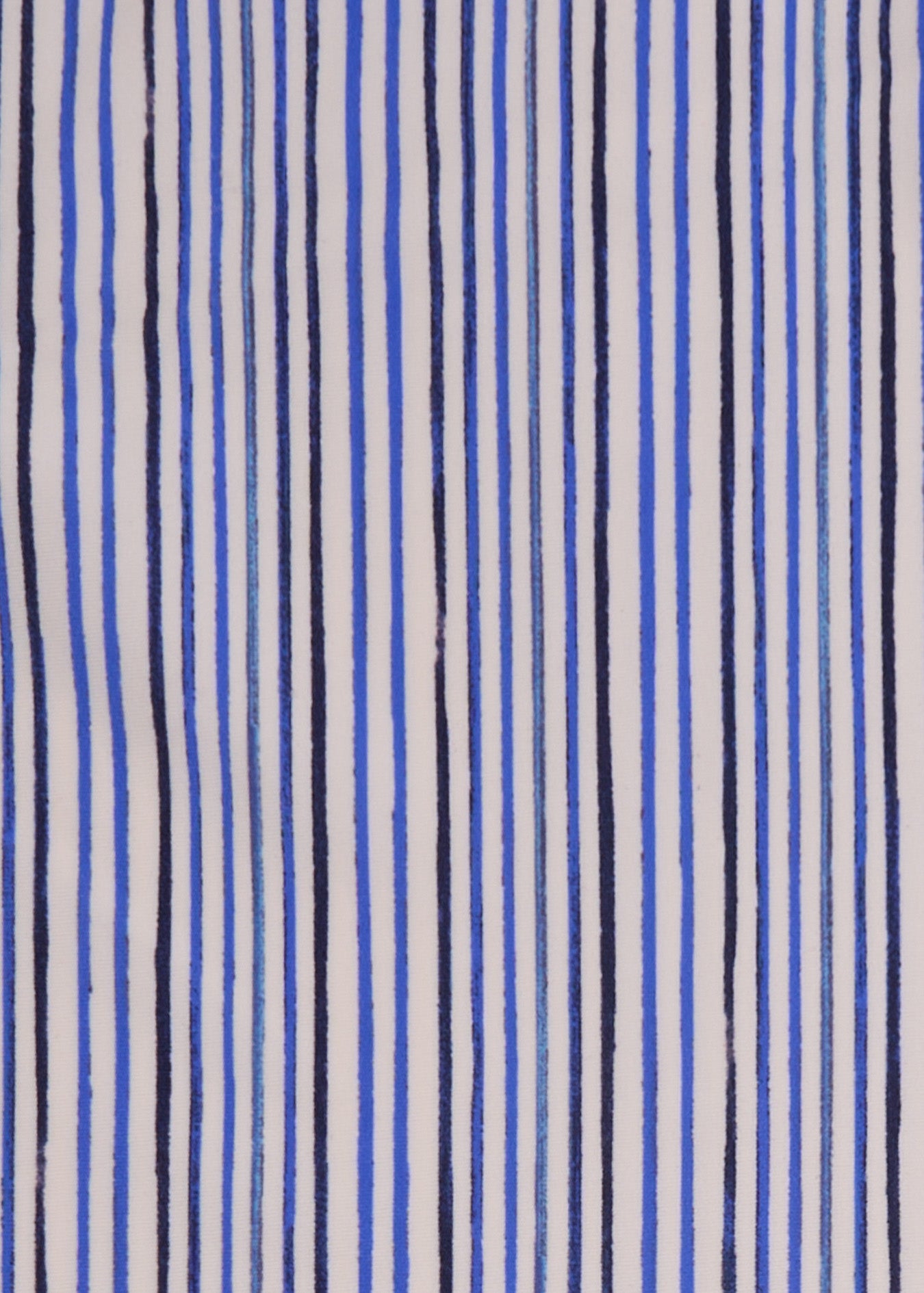 A close up of Cabana Life's Seaside blue and dark navy striped print on a UPF 50+ fabric.
