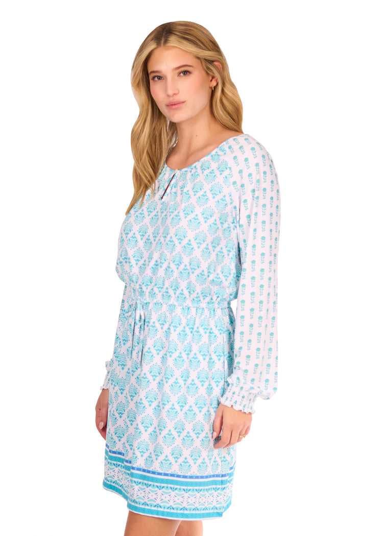 Side of woman in Amalfi Coast Long Sleeve Tie Waist Dress