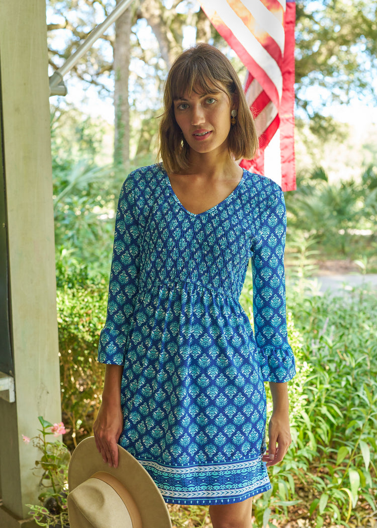 Woman wearing Kiawah Smocked Babydoll Dress