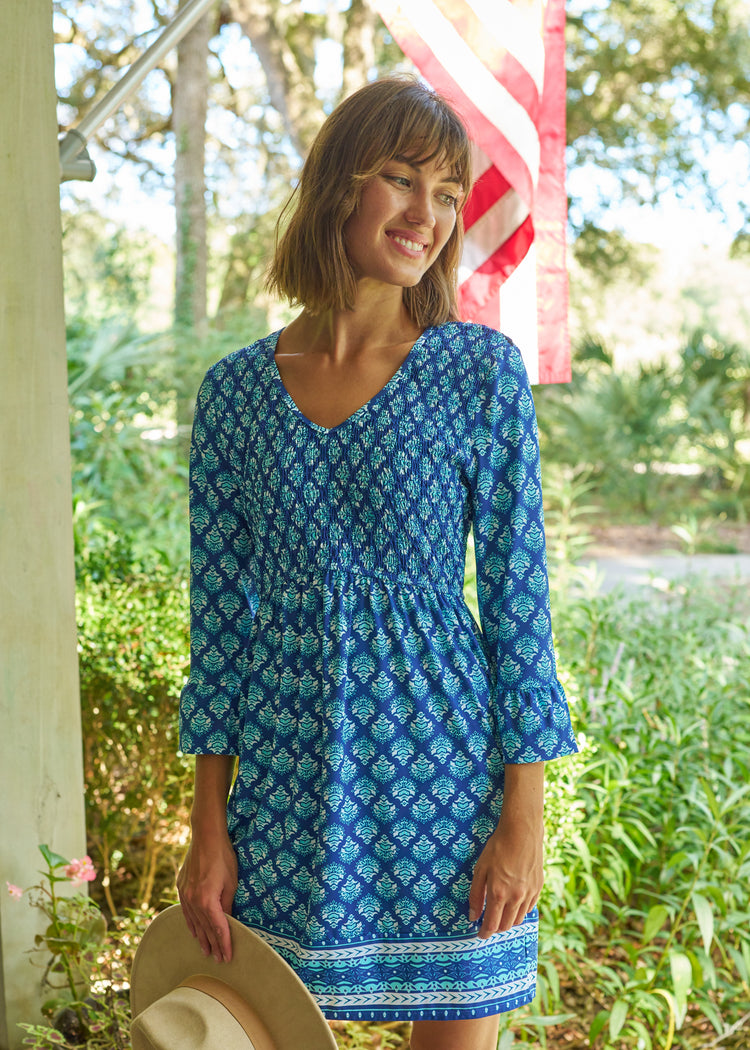 Woman wearing Kiawah Smocked Babydoll Dress