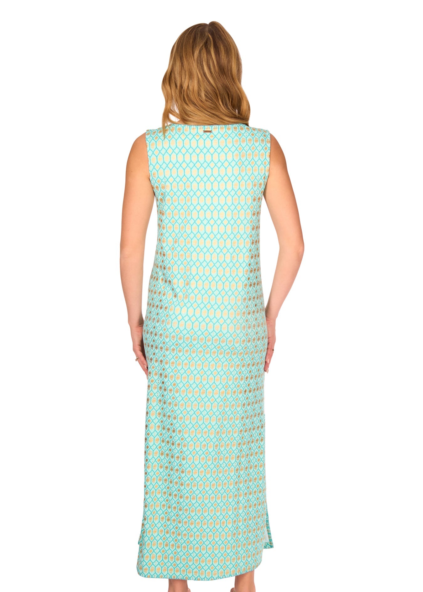 The back of a blonde woman wearing the Aqua Metallic Side Slit Maxi Dress on a white background.