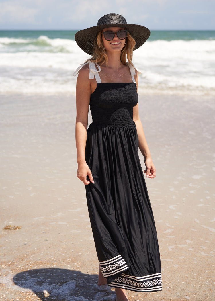 Woman wearing Black Wide Brim Sun Hat.