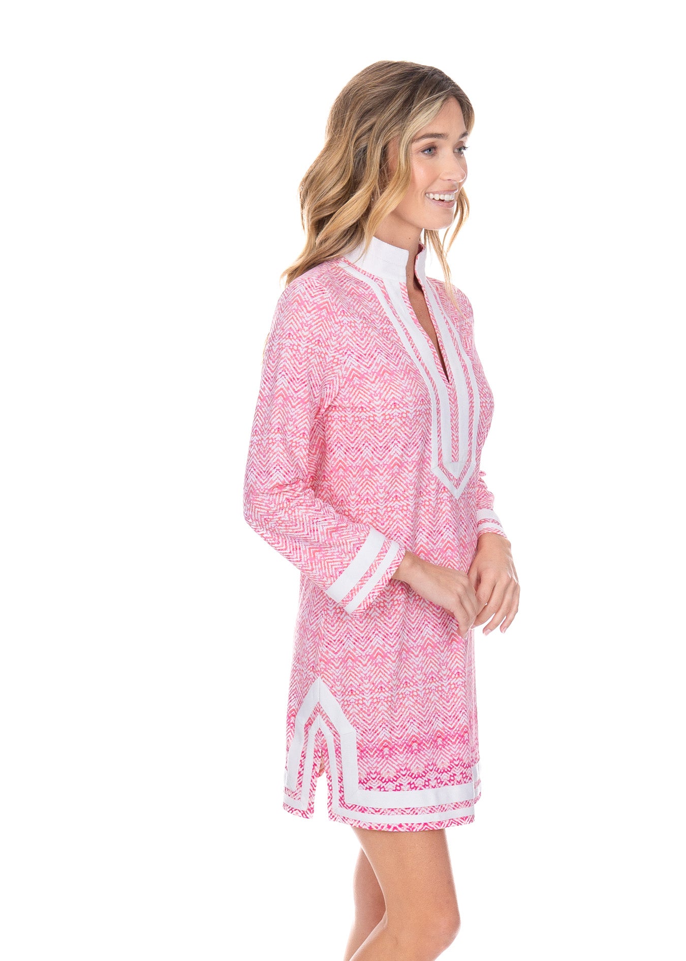 Blonde woman wearing the Algarve Tunic Dress while facing the side