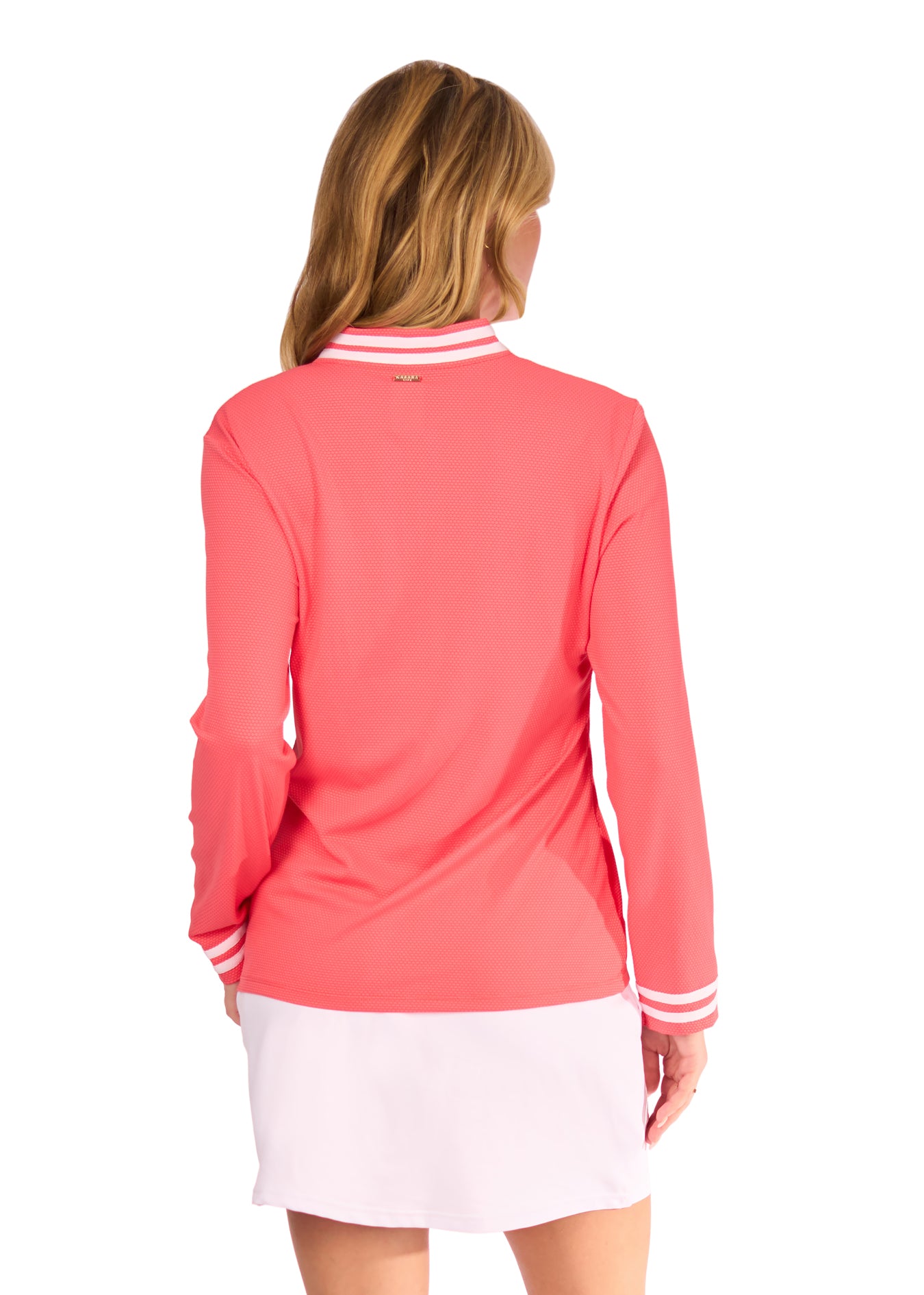Back of Woman in Coral Collared Quarter Zip and White Skort