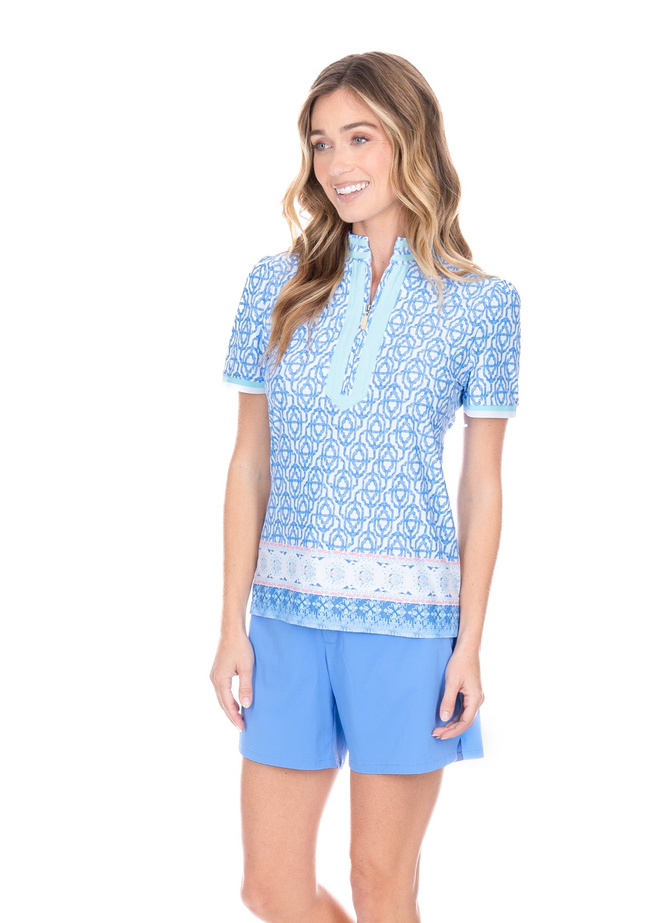 Blonde model wearing the Lake Como Short Sleeve Collared Quarter Zip.