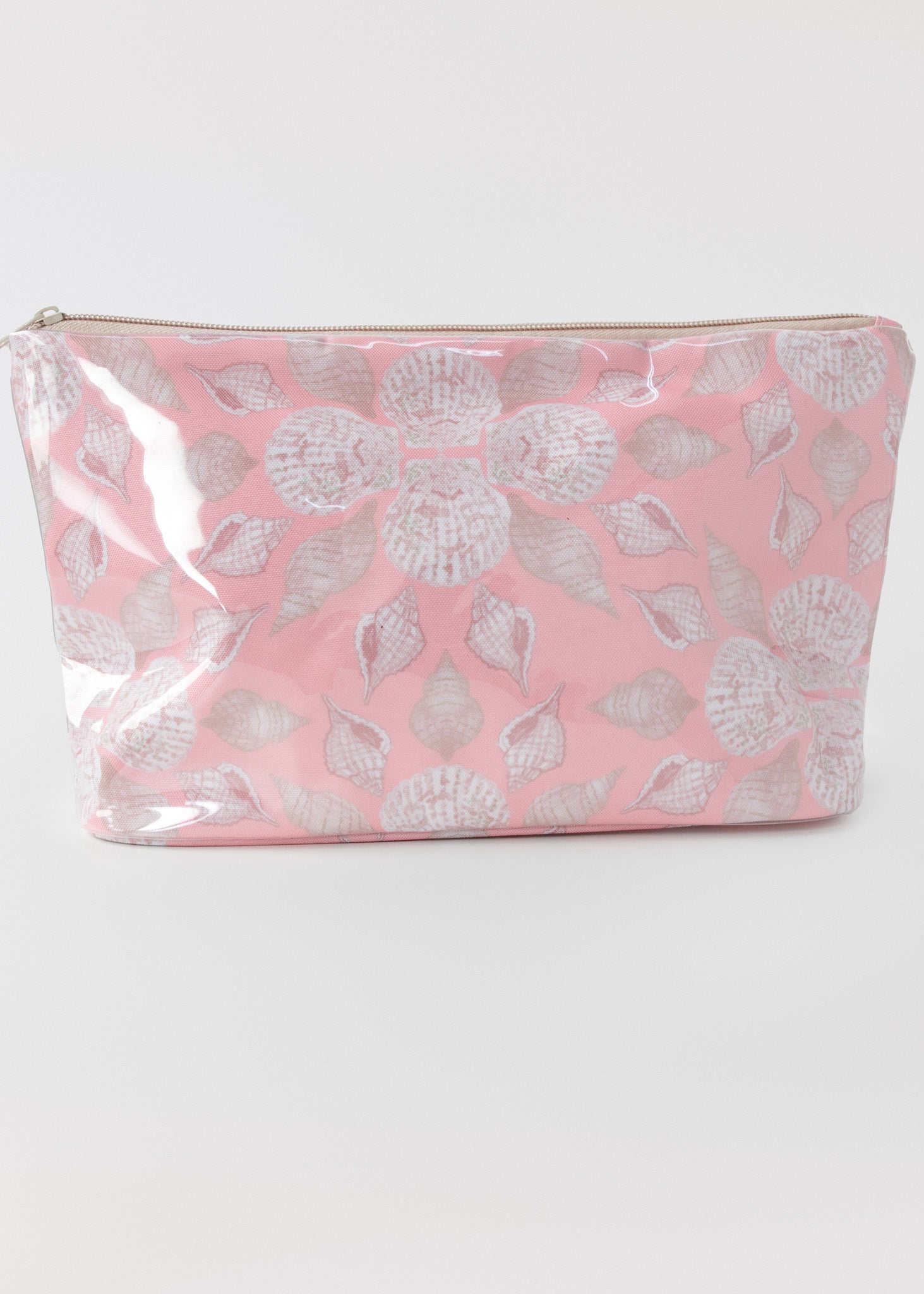 Pink accessory bag with seashell pattern on a white background