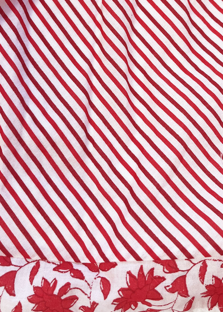 Vertical red and white stripes pattern filling the frame.