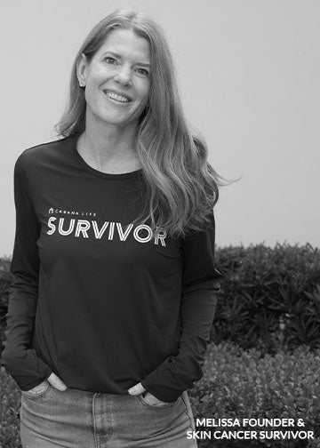 Our founder & skin cancer survivor Melissa wearing our sun safe Black Unisex Long Sleeve Survivor Performance Shirt.