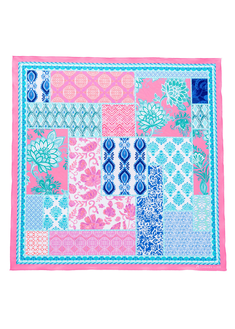 Flatlay of colorful Printed Patchwork Scarf on white background.