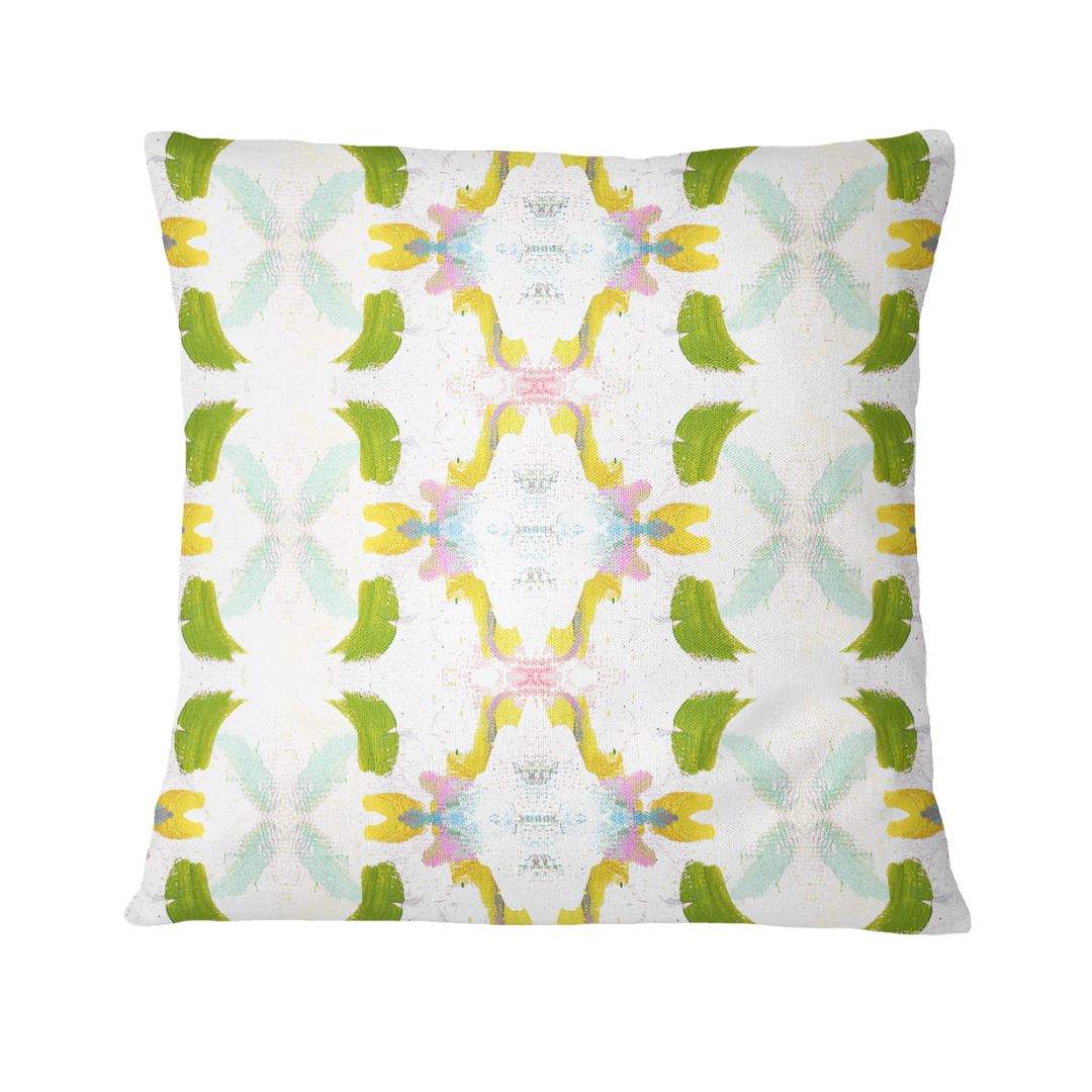 Decorative pillow with a colorful geometric pattern on a white background