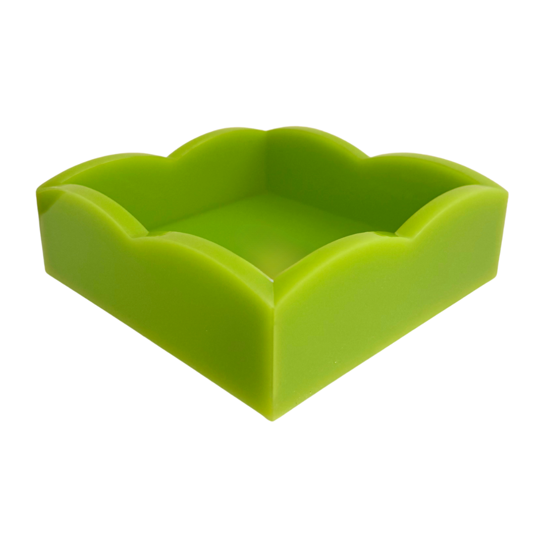 Green acrylic napkin holder on a white background