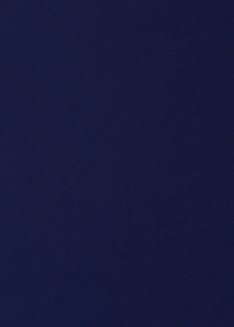 A close up of the UPF 50+ navy fabric on the Cabana Life Navy Zipper Rashguard.