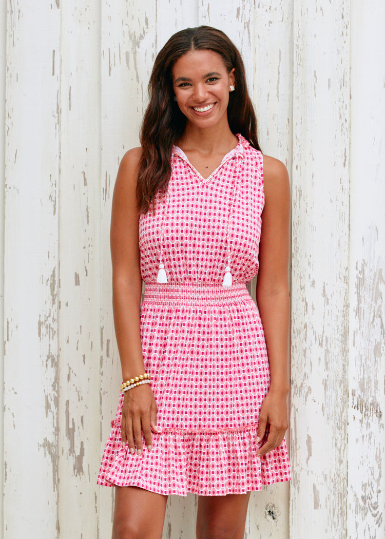 Woman wearing Coral Gables Sleeveless Ruffle Dress.