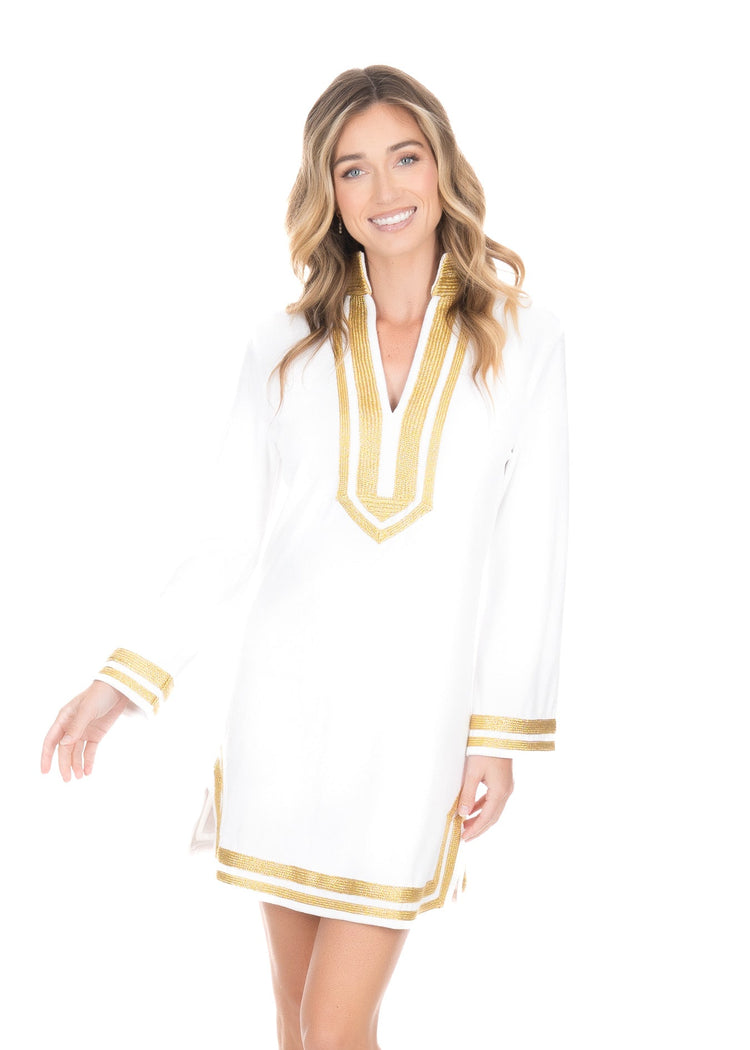 The front view of a woman wearing the sun protective Cabana Life White/Gold Terry Tunic. 
