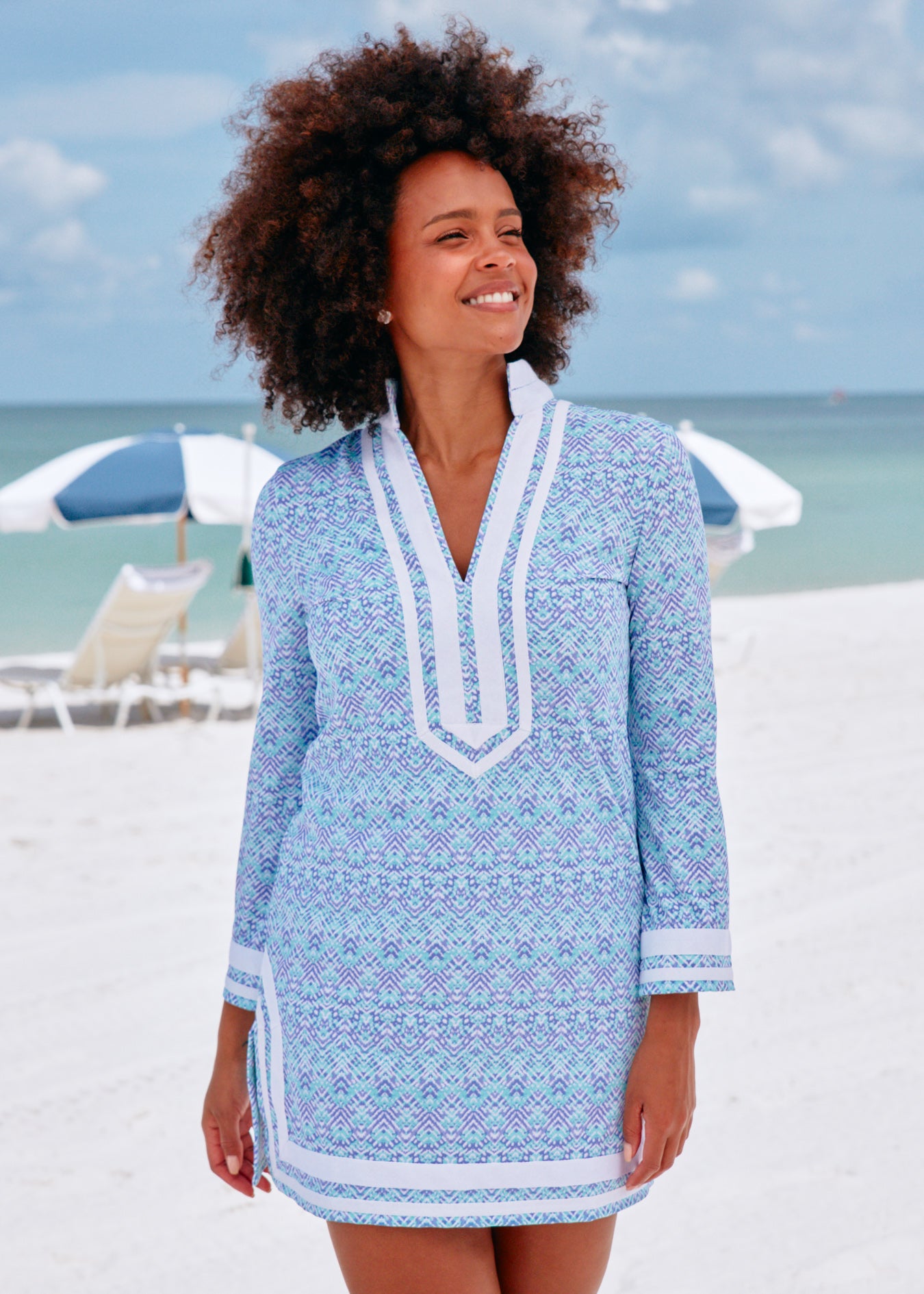Woman on beach wearing Naples with white trim terry tunic.