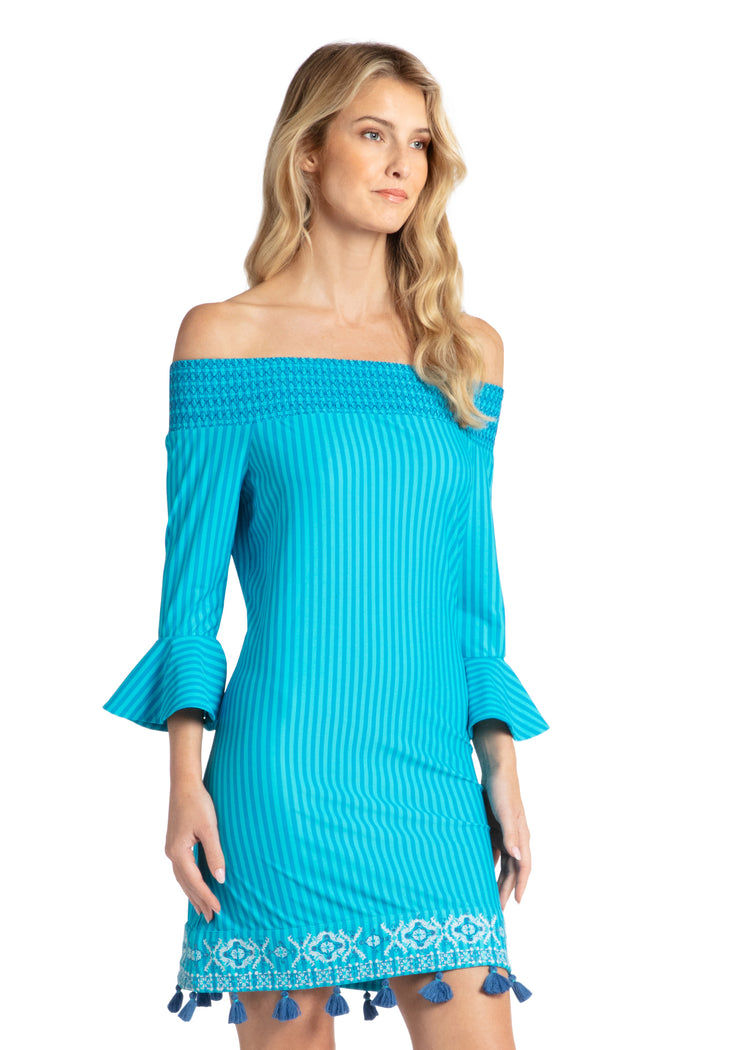 Woman modeling side of Palm Valley Embroidered Off The Shoulder Dress.