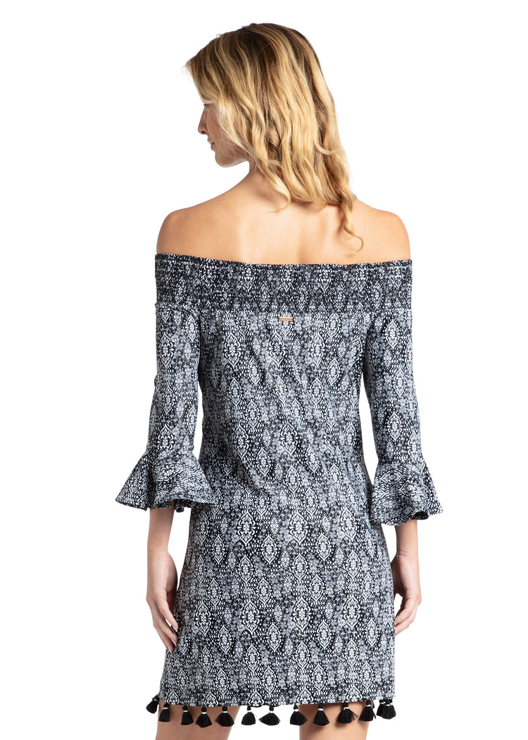 Woman wearing Sanibel Off The Shoulder Dress.