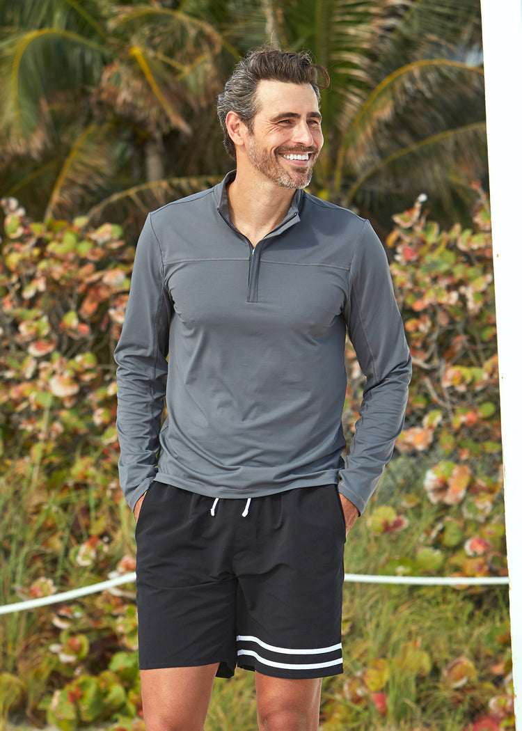 Man wearing Cabana Life Grey Sport Zip Top and Black Swim Trunks with UPF 50+