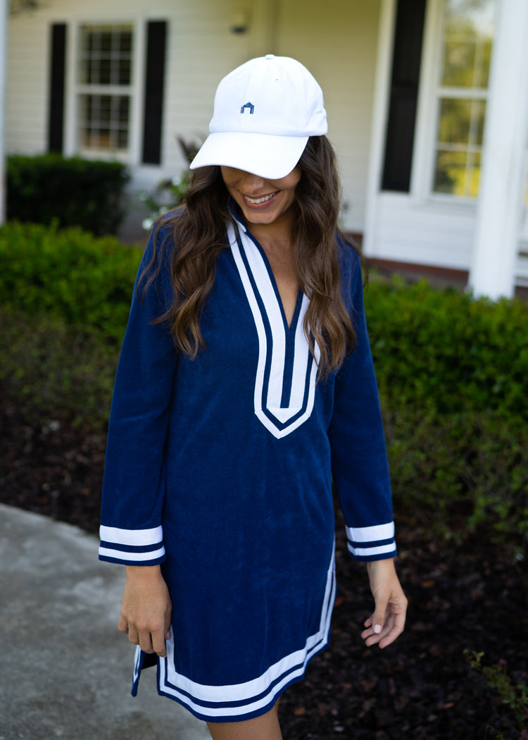 Woman wearing White Cabana Life Baseball Hat and Navy/White Terry Tunic