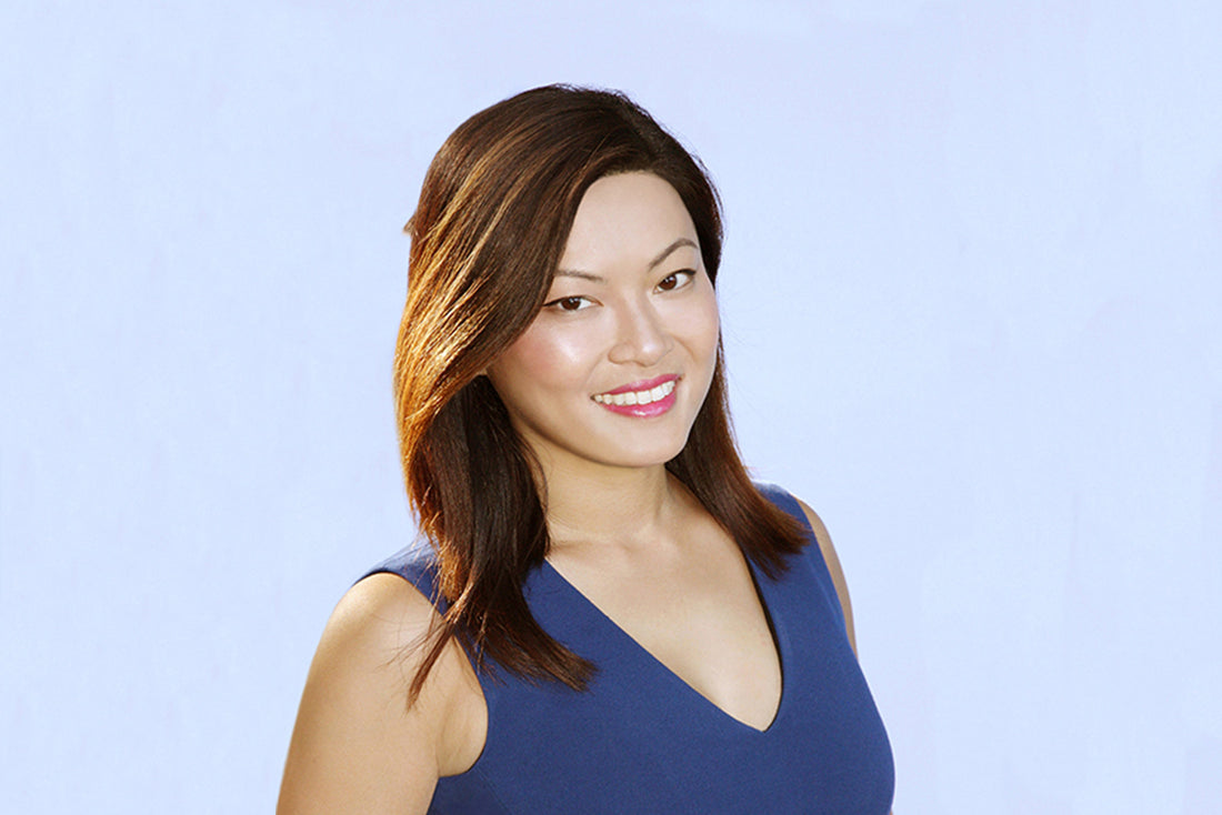 Doctor Caroline Chang on light blue background