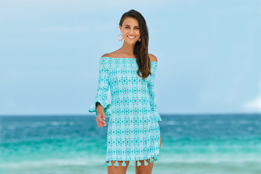 Woman on beach wearing Cabana Life Sunshine Shores Off The Shoulder Dress