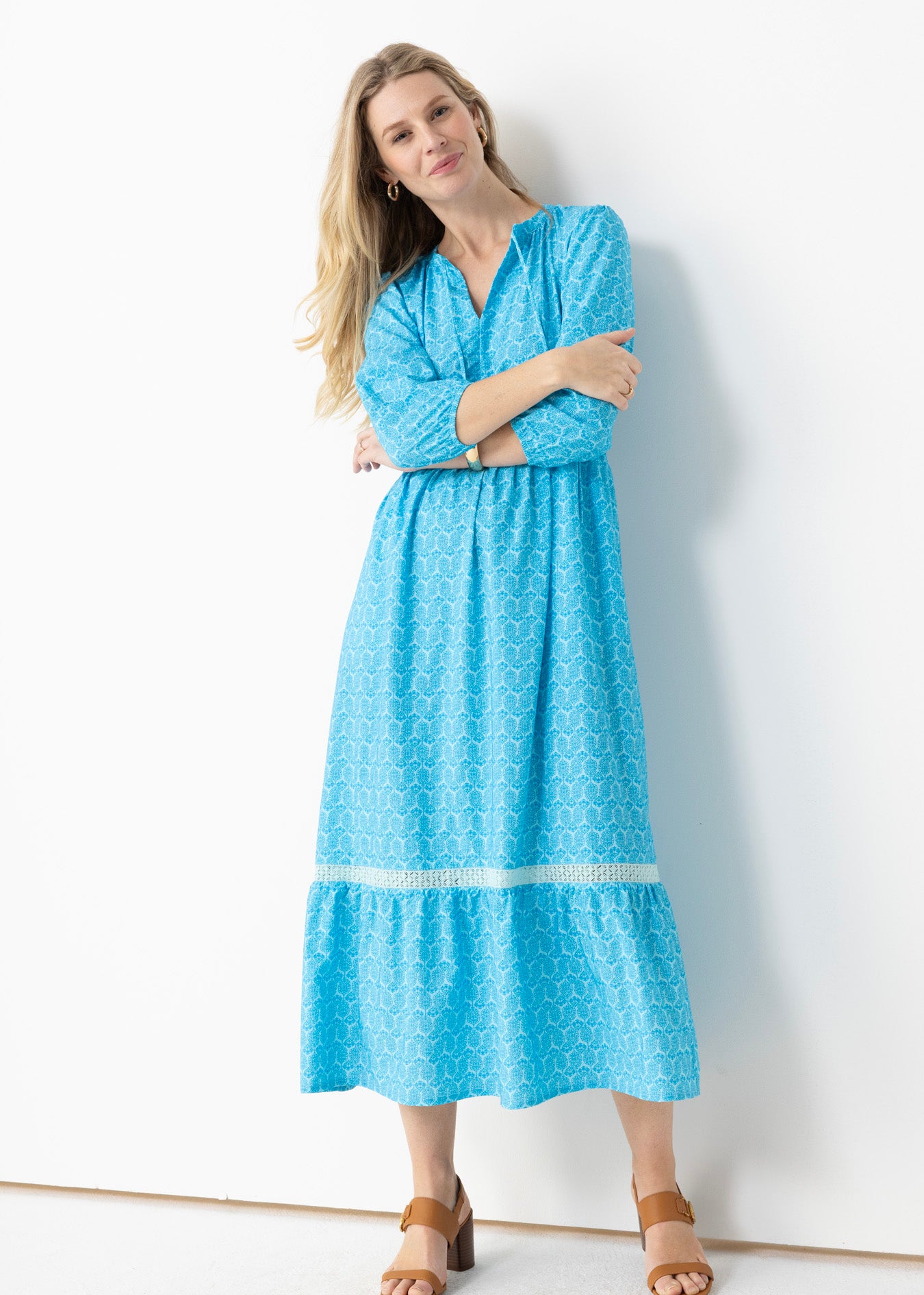 Blonde woman wearing Rosemary Beach Relaxed Maxi Dress in a studio.
