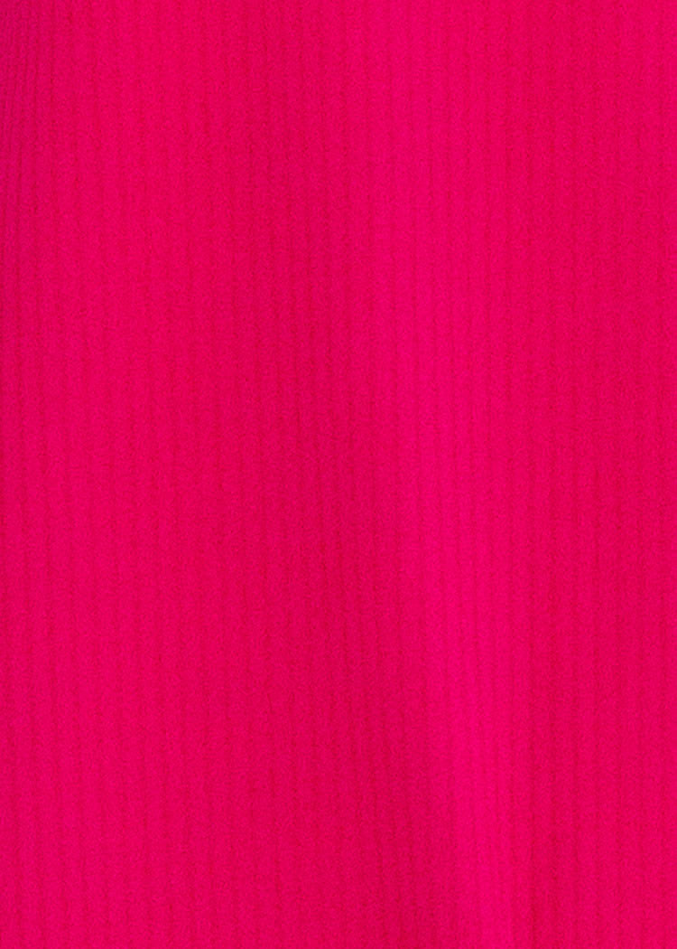 Close-up of a bright pink fabric texture