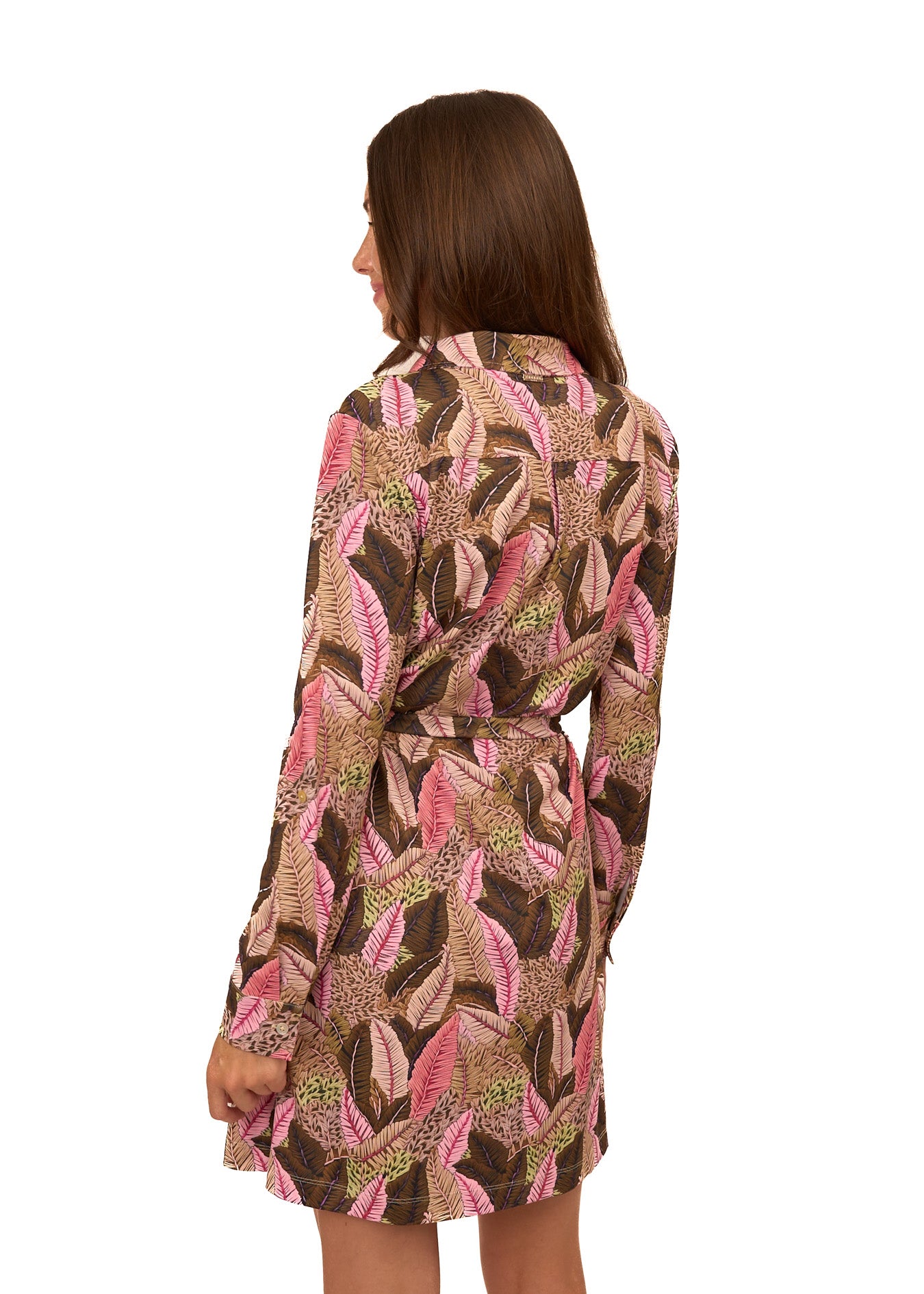 The back of a brunette woman wearing Cabana Life's sun protective Myers Button Down Shirt Dress on a white background.