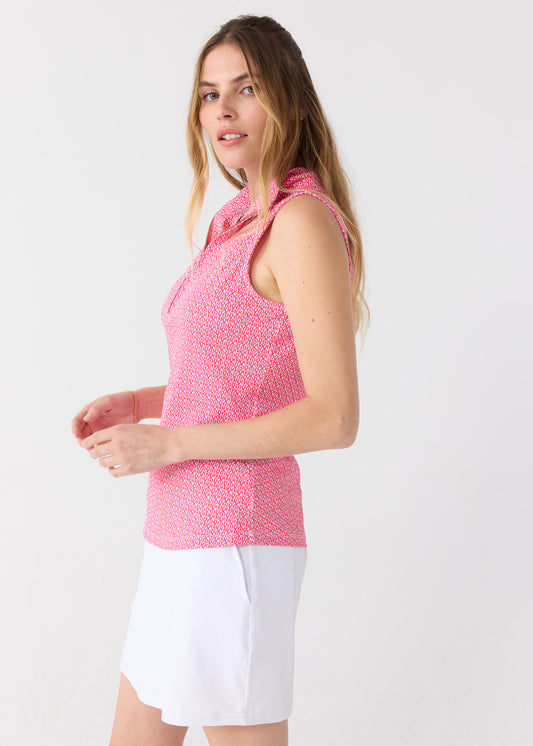 The side of a blonde woman wearing the Cabana Life sun safe Amelia Island 1/4 Zip Sleeveless Sport Top with a White 15" Skort.