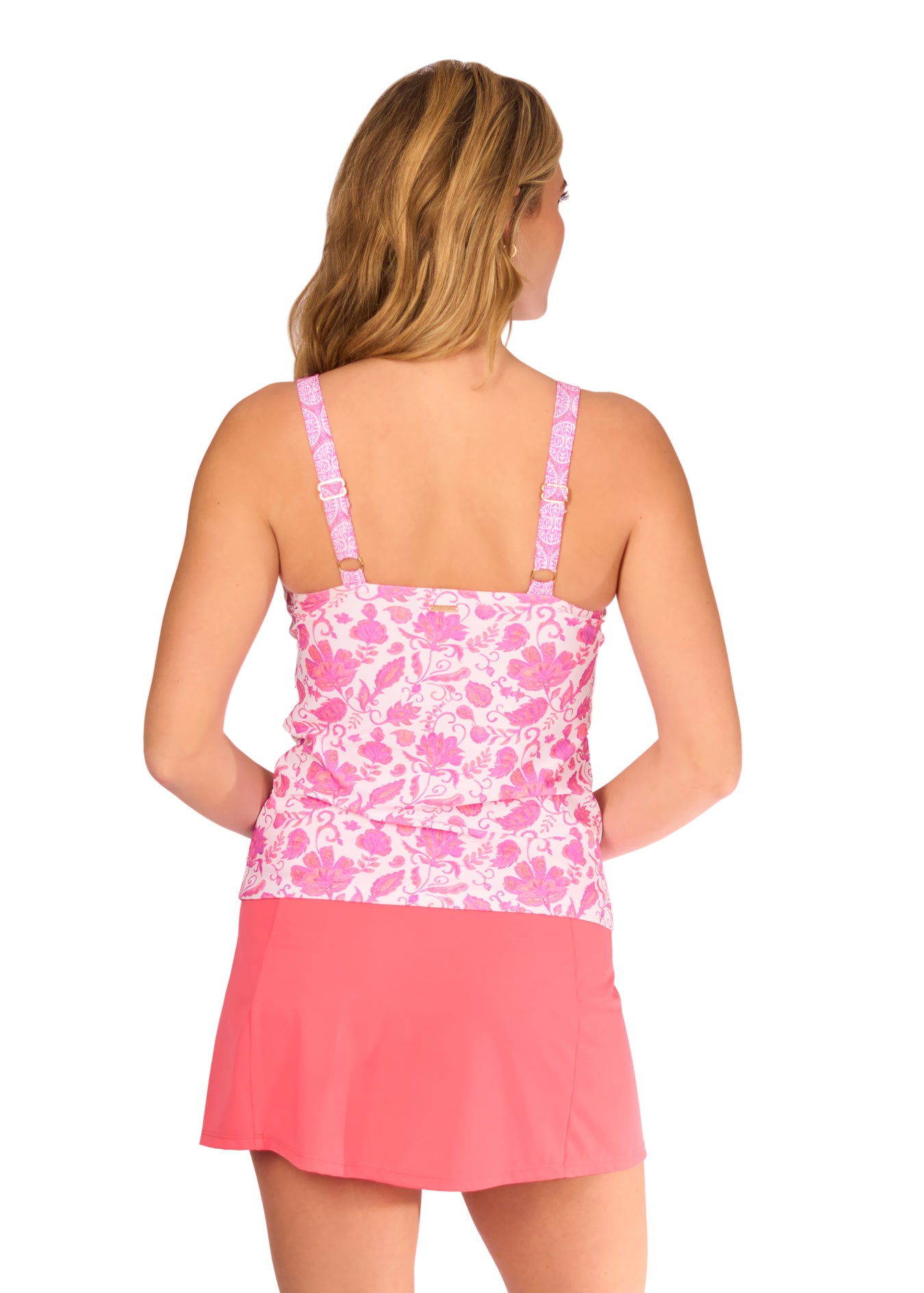 Back of woman in Provence Tankini Top and Coral Classic Swim Skirt.