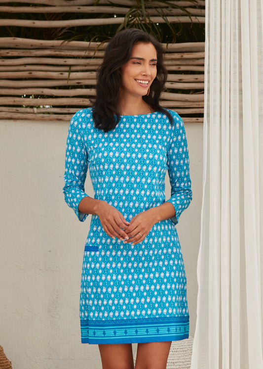 Woman with arms crossed wearing Palm Valley Cabana Shift Dress.