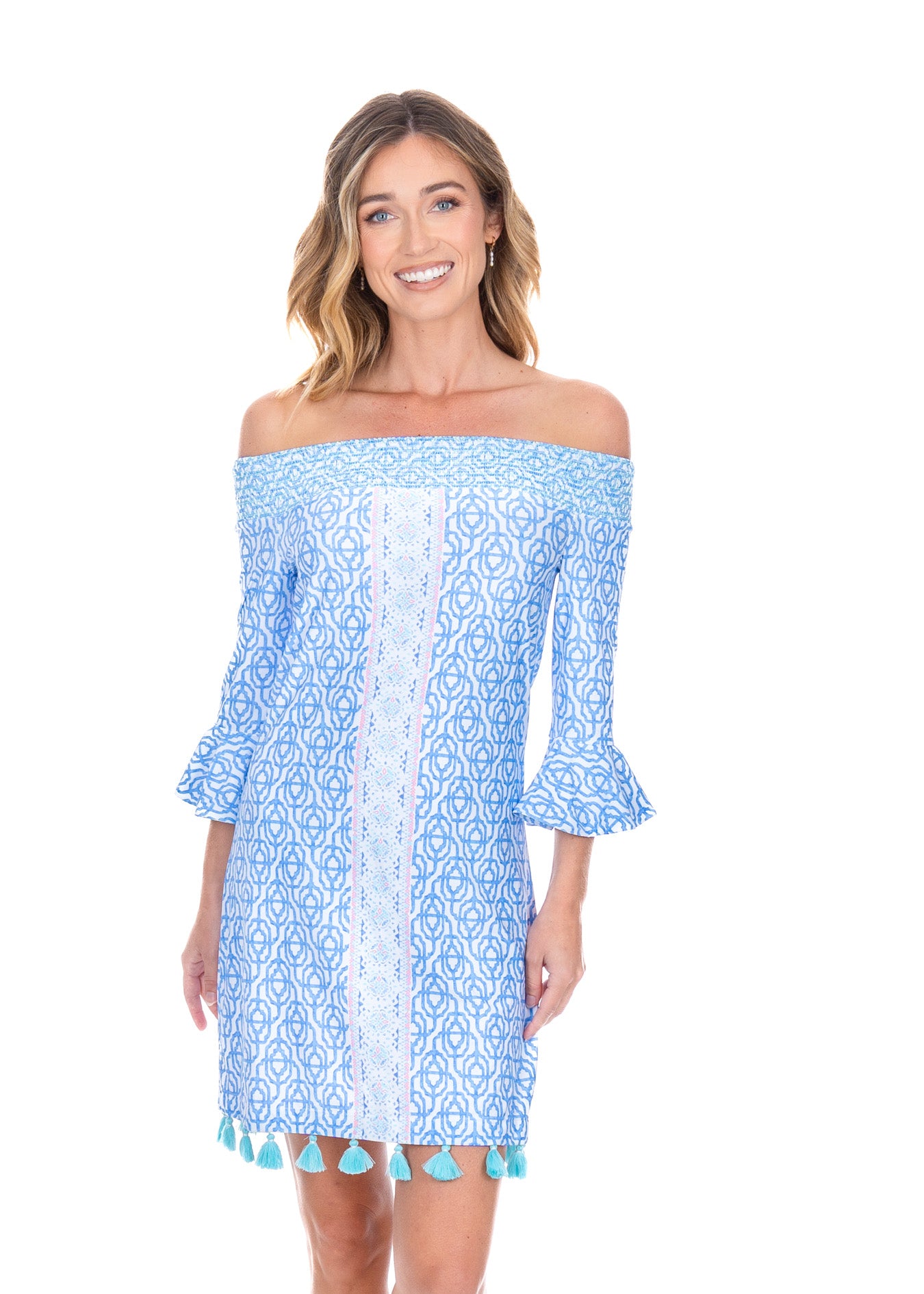 Front facing blonde woman wearing the Lake Como Off the Shoulder Dress. 