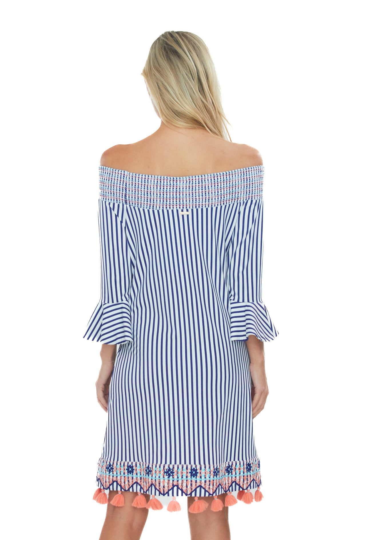 Back of blonde woman wearing the St. Barts Off the Shoulder Dress in front of white background.