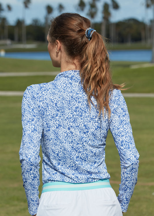 Woman wearing Lake Como 1/4 Zip Sport Top and White Shorts with San Sebastian Cabana Life x Teleties Hair Tie 3-Pack on ponytail