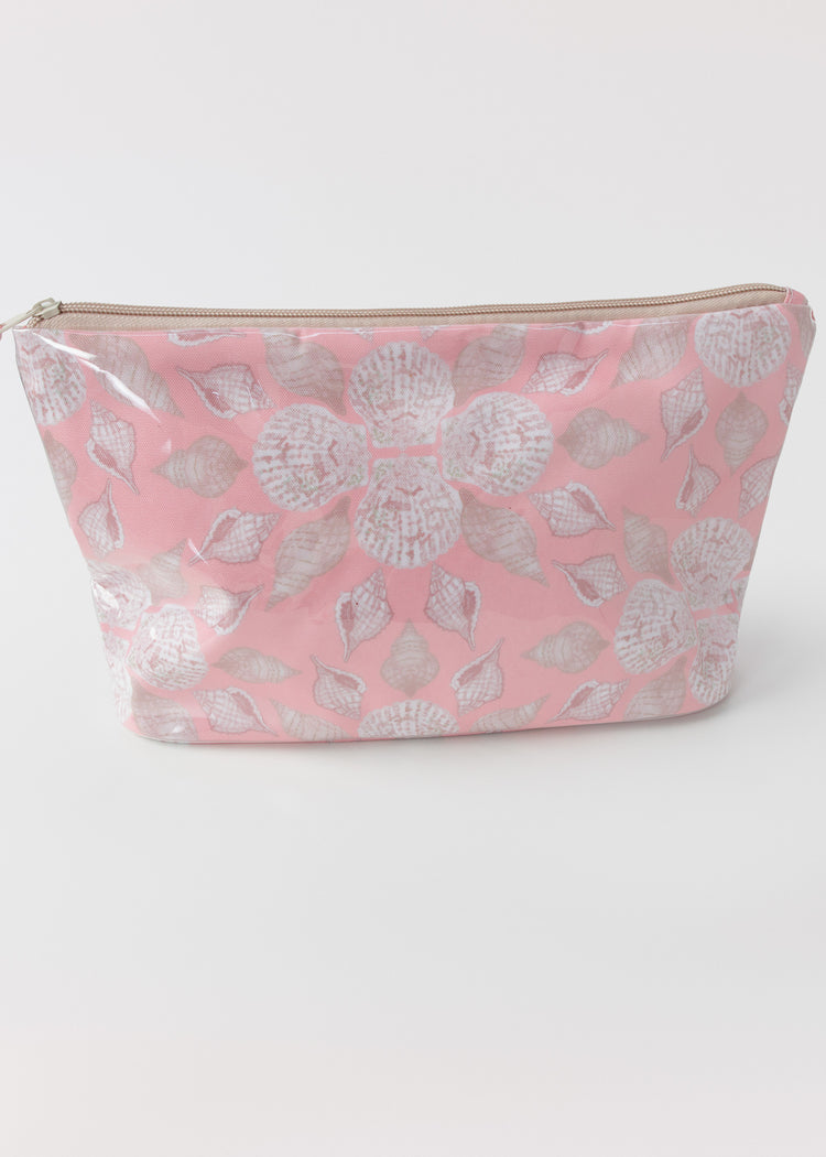 Pink accessory bag with seashell pattern on a white background