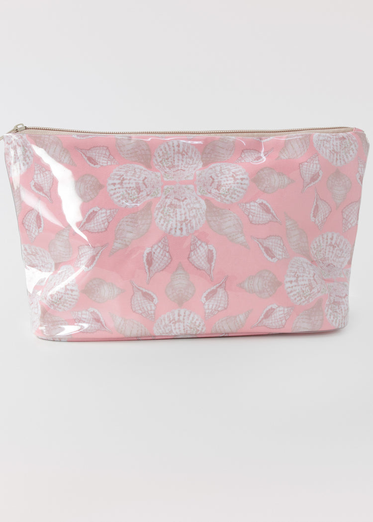 Pink accessory bag with seashell pattern on a white background