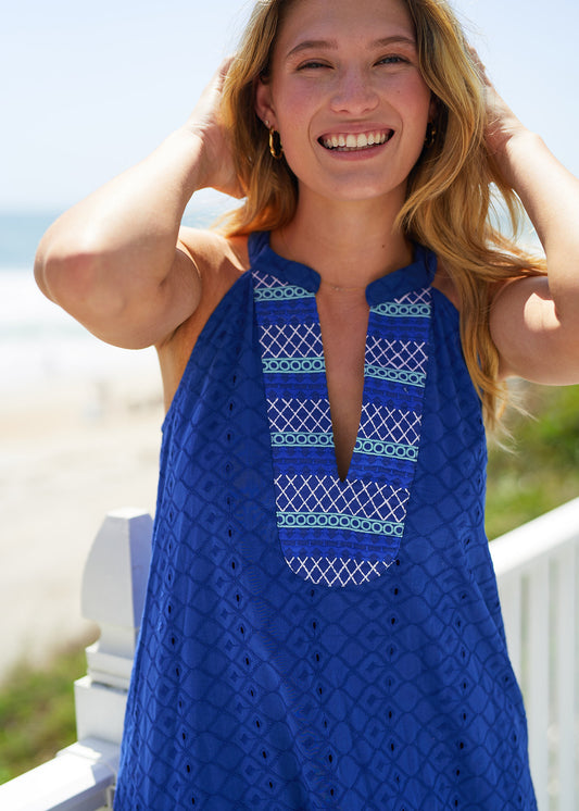 Woman wearing Navy Embroidered Eyelet Halter Dress