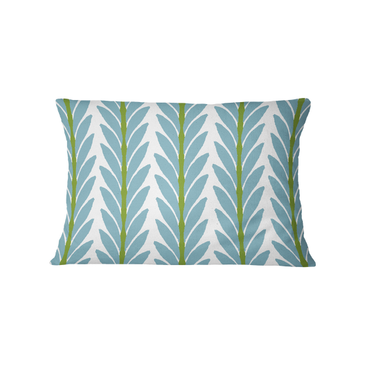 Decorative pillow with leaf pattern on a white background