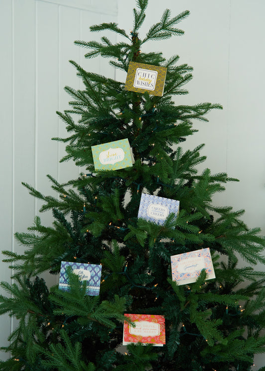 Christmas Tree with Cabana Life Holiday Card Pack on tree