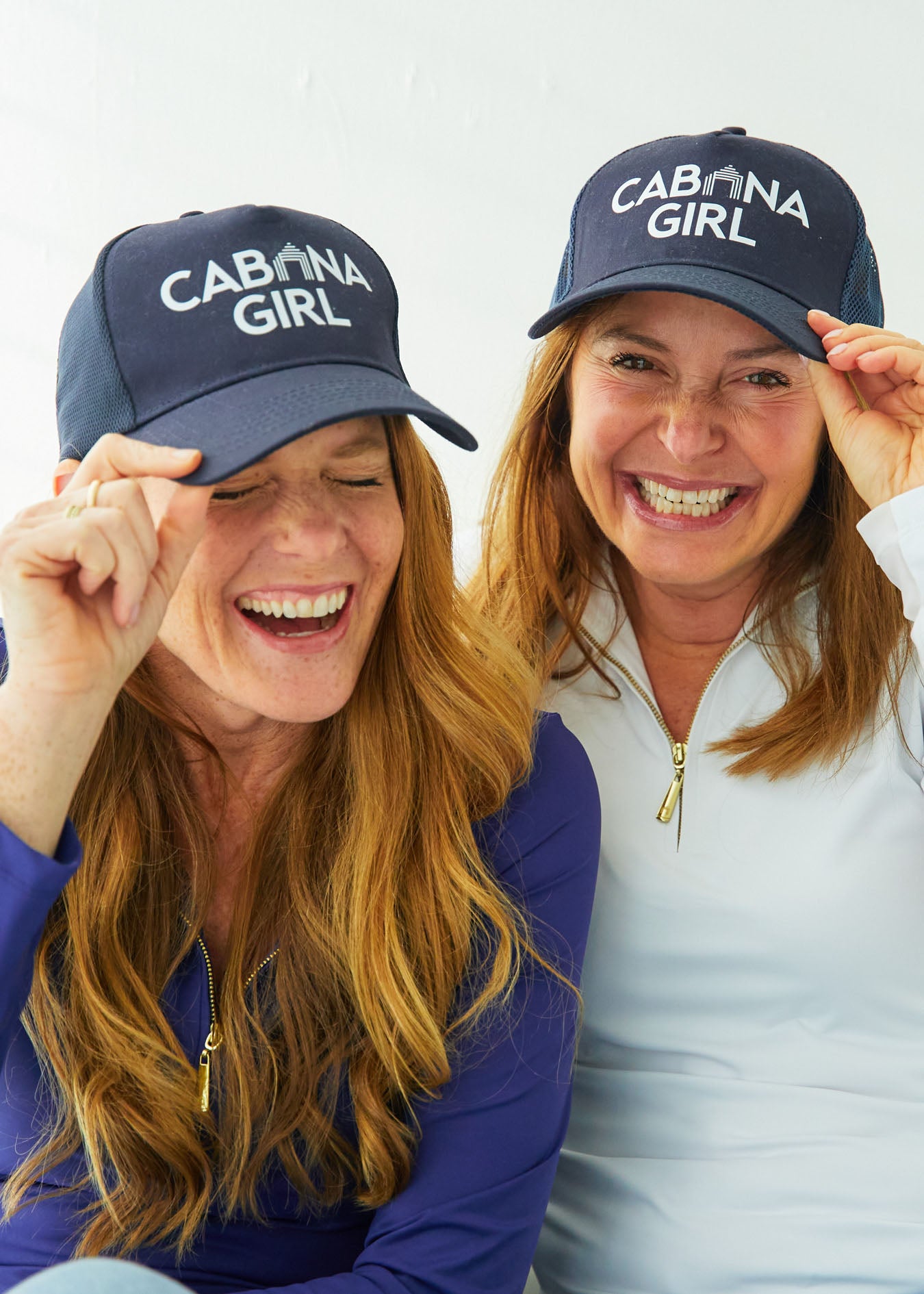 Woman wearing Cabana Girl Hats and Sport Zip Tops.