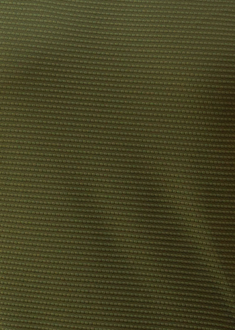Green textured fabric with gold metallic detailing