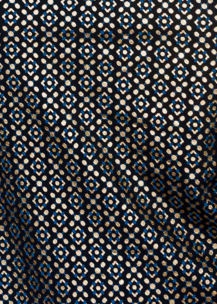 swatch of the dress swatch of a black print with gold and blue accents