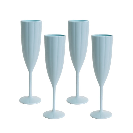 Four light blue champagne flutes on a white background