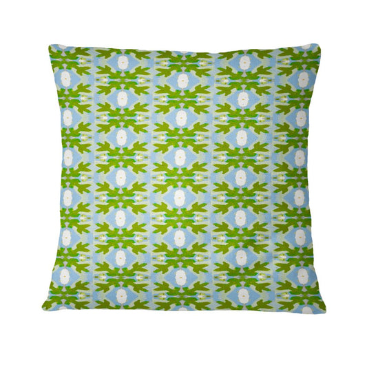 Decorative pillow with a green and blue pattern on a white background