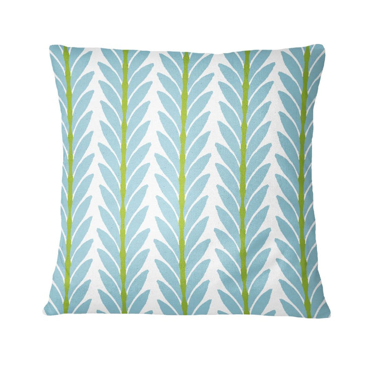 Decorative pillow with leaf pattern on a white background