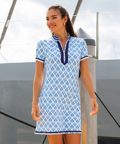 Women wearing a blue and white printed sport dress.