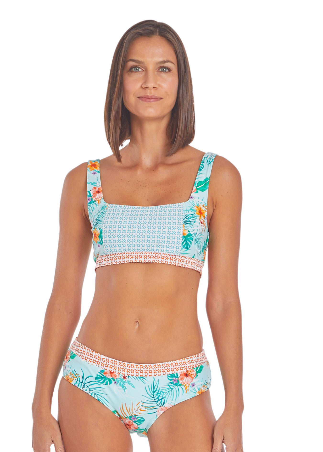 Woman wearing Cabana Life Cayman Reversible Bikini Bottom and Reversible Bikini Top.