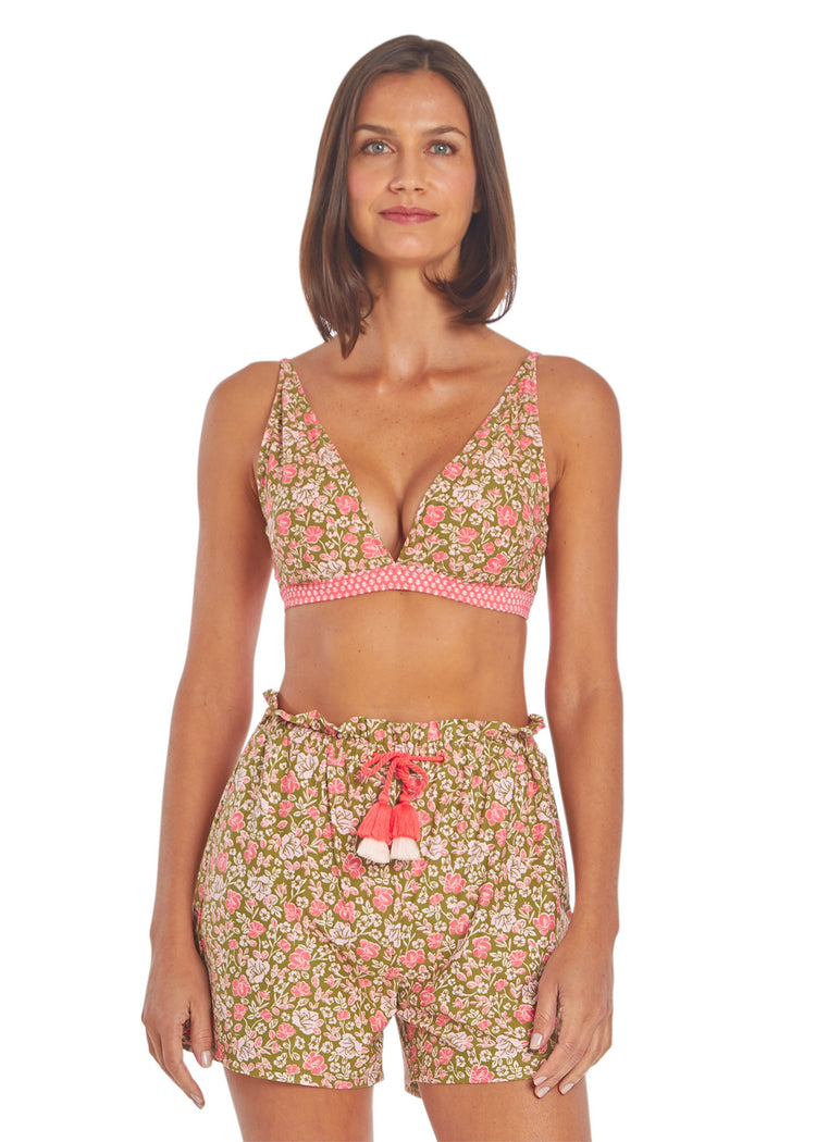 Woman wearing Jetties Beach Reversible Triangle Bikini Top & Jetties Beach Paperbag Waist Tassel Short